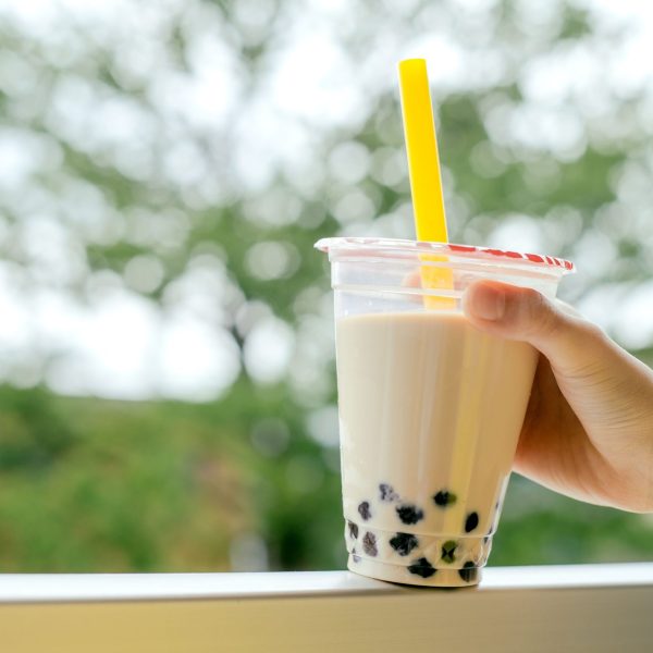 human-hand-holding-a-cup-of-iced-cold-bubble-tea-with-milk-and-tapioca-pearls-1157712696-b89d2ab1748543d1b1d7101c68cde5d0.jpg