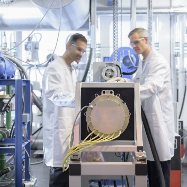 scientists-testing-lithium-car-battery-with-electric-motor-car-in-battery-research-facility-599833897-1585c6e9bb354bed8461a6eda05e3c2e.jpg